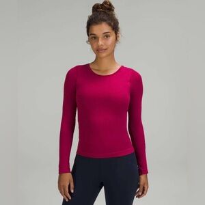 Lululemon Ebb to Street Waist-Length Long Sleeve Shirt
Pomegranate sz 2 EUC